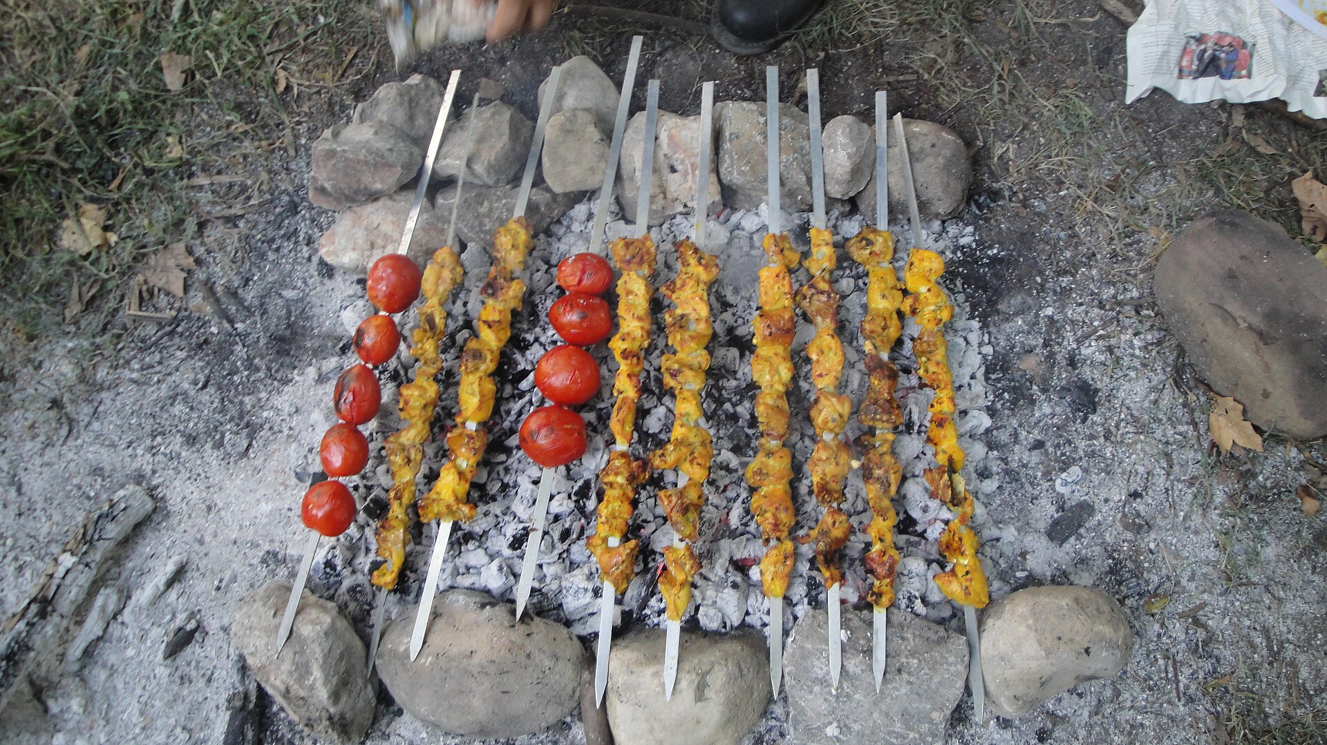 Illustrative photo of jujeh kebab (saffron chicken skewers), not from Berenjak Chicago
