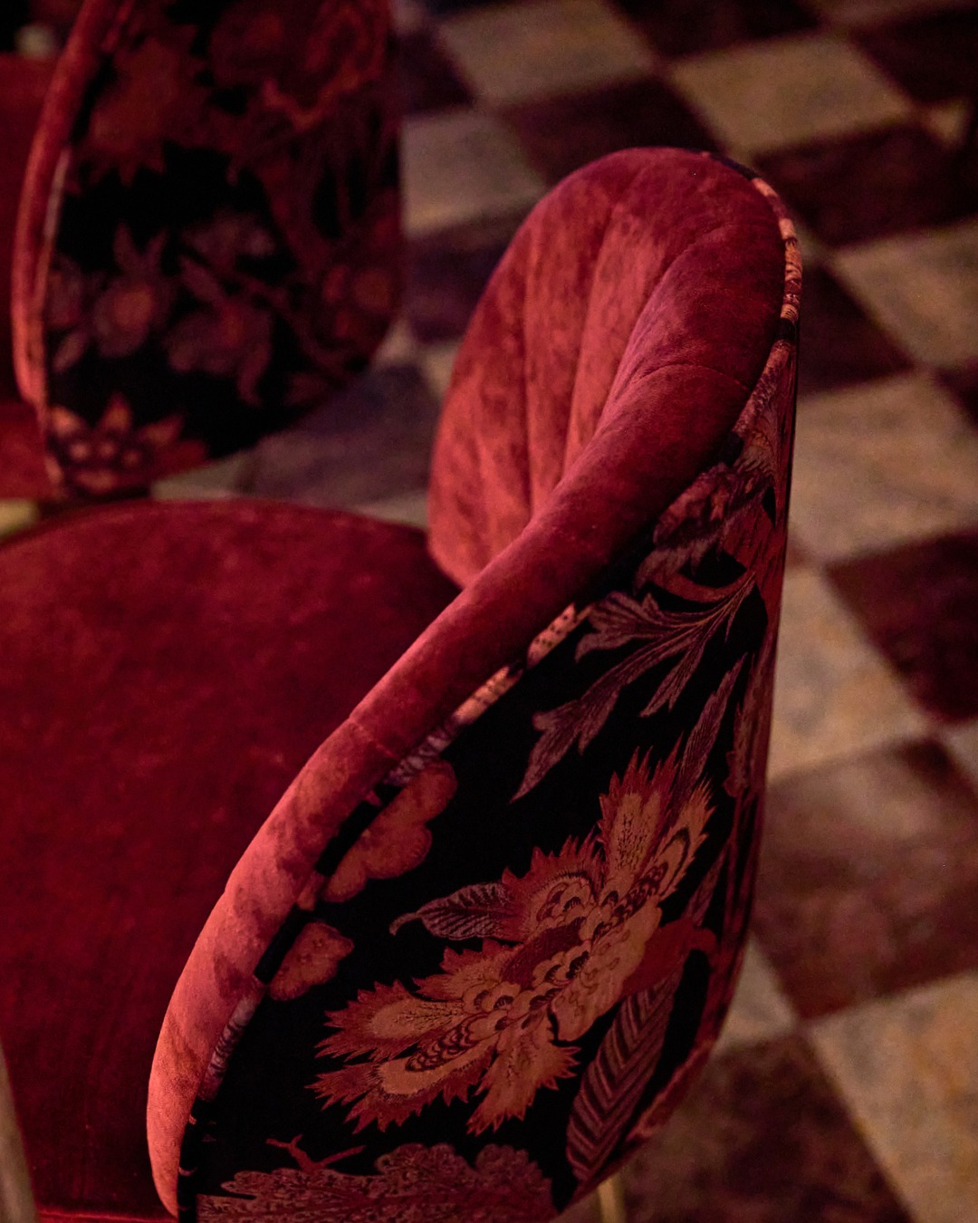 Gingie Chicago interior detail with red velvet chair