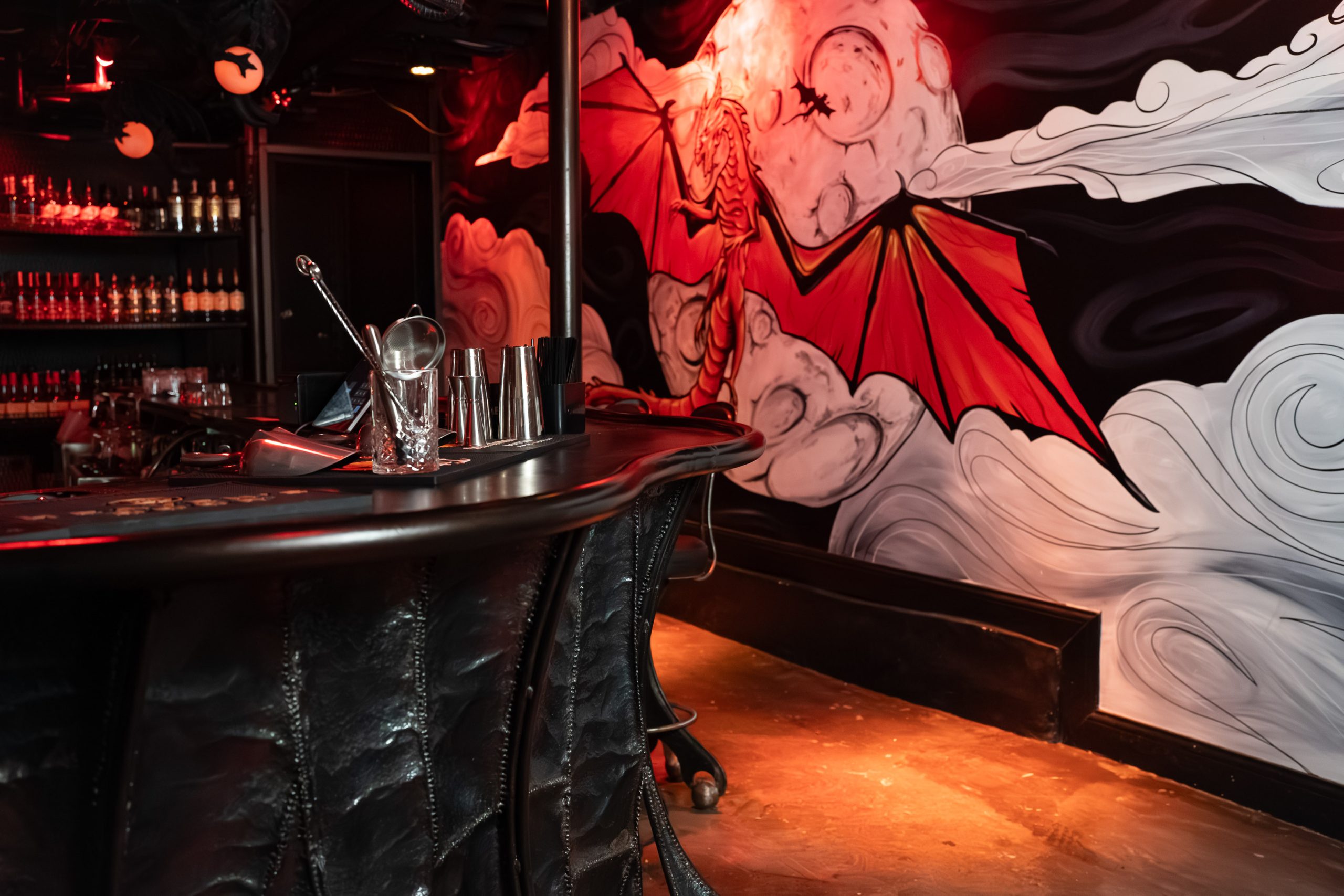 The Lair Chicago dragon mural and scale-textured bar