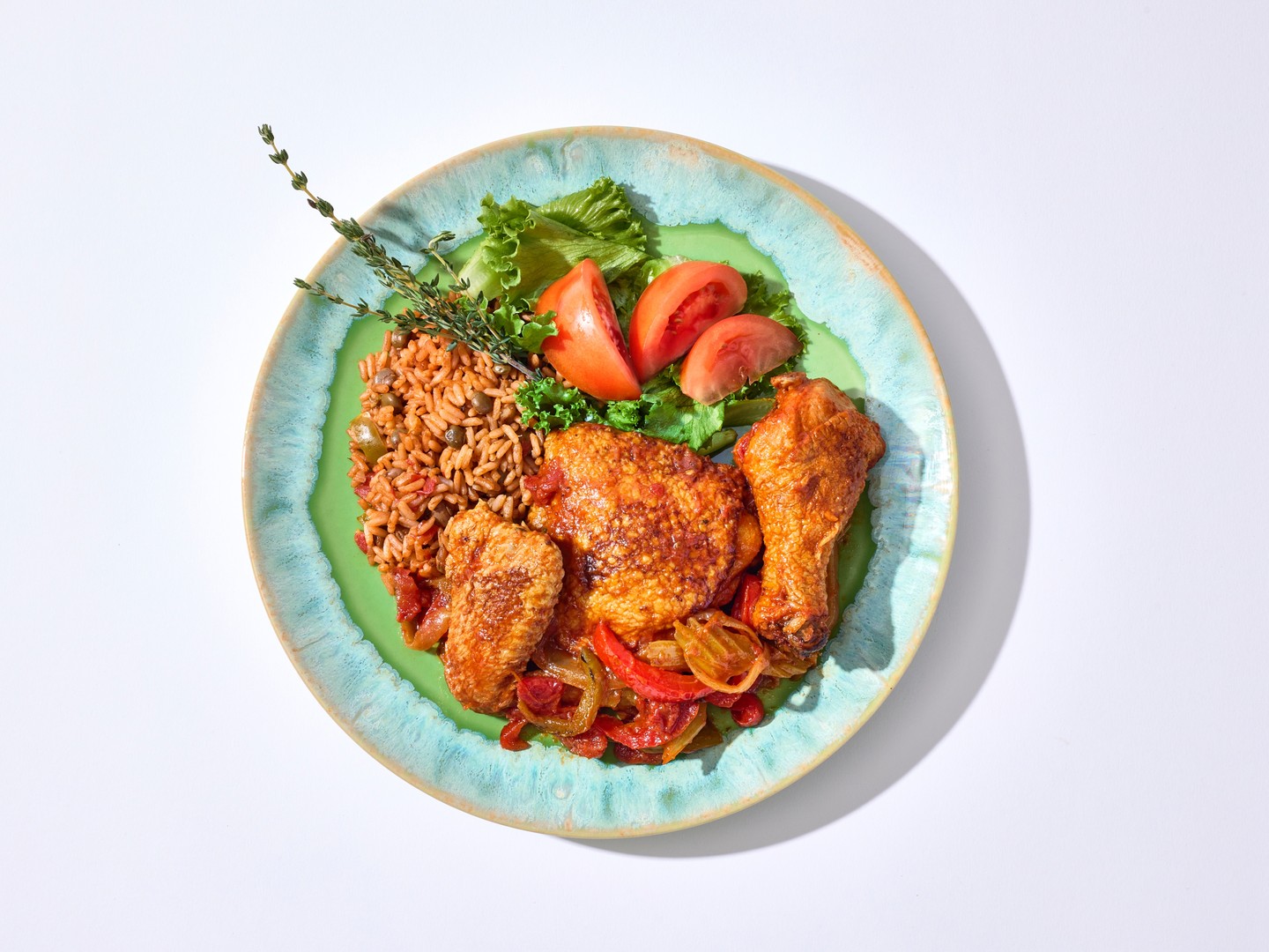 Bahama Shack Chicago steamed chicken with pigeon peas and rice on island-style plate