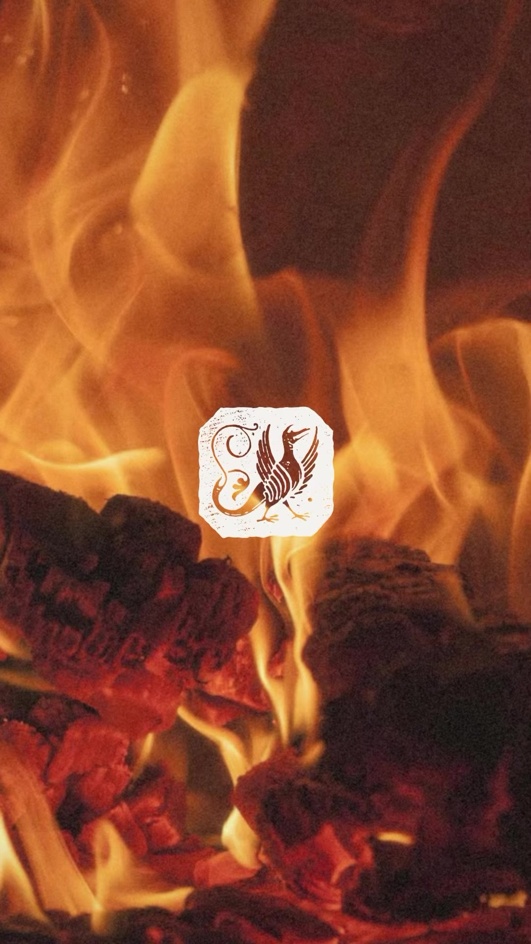 Black Briar Chicago crest over wood fire