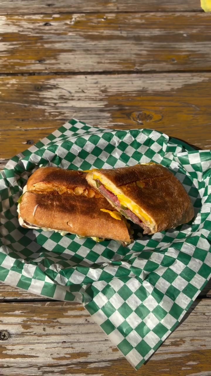 Piccadilly Market Lincoln Park toasted sandwich on green checkered paper
