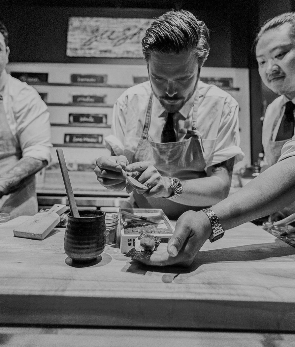 Sushi by Scratch Chicago chefs including Phillip Frankland Lee preparing omakase at the counter