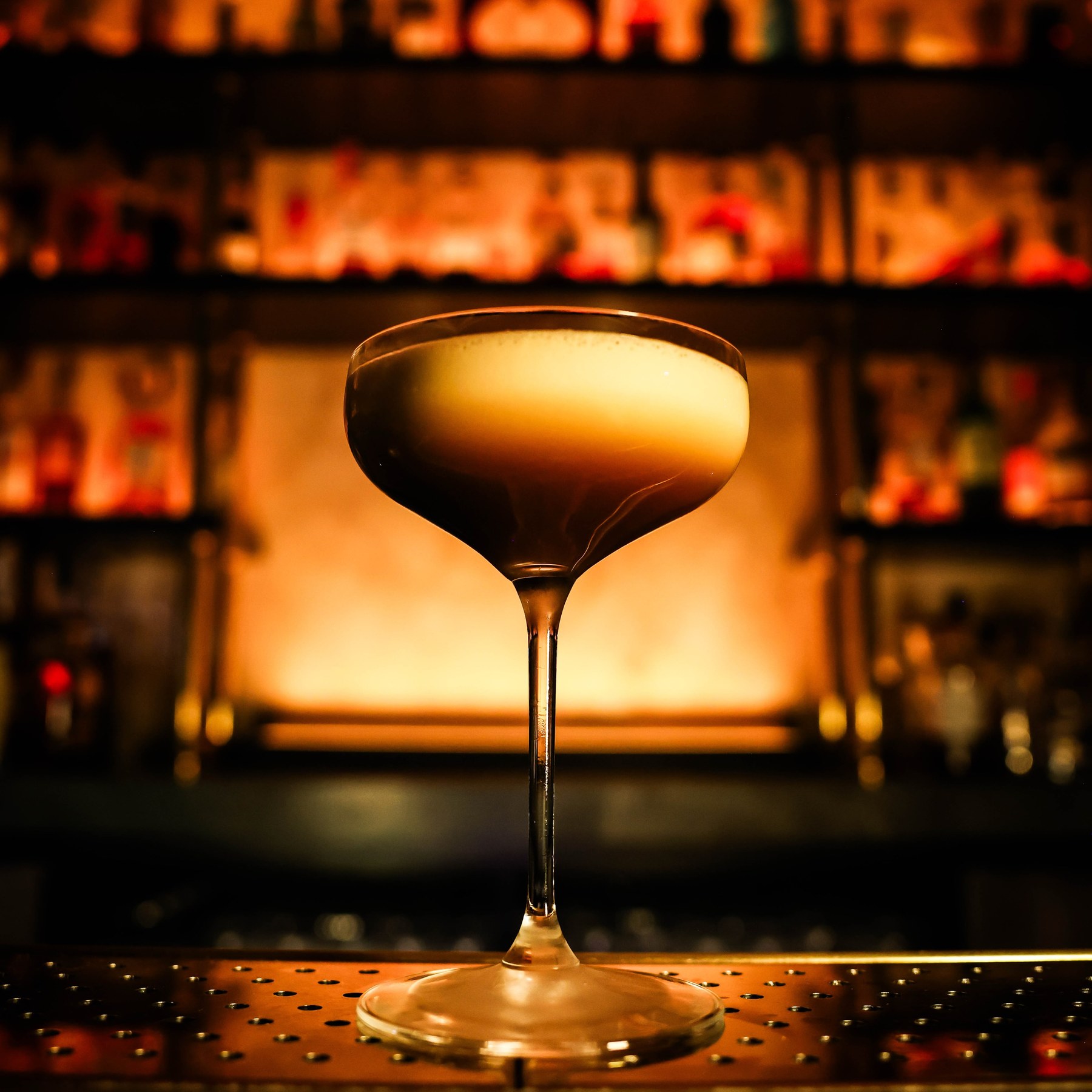 Espresso martini in a coupe glass at The Alston Chicago bar