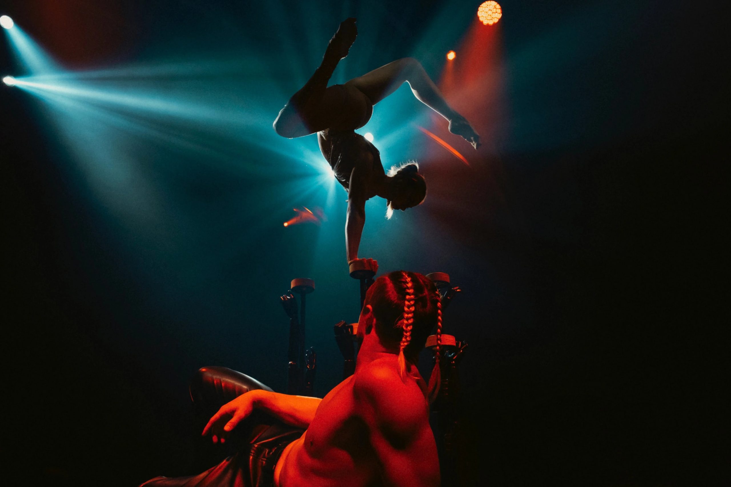 Illustrative Circensia aerialist performance — not Premonitions Inc. production still
