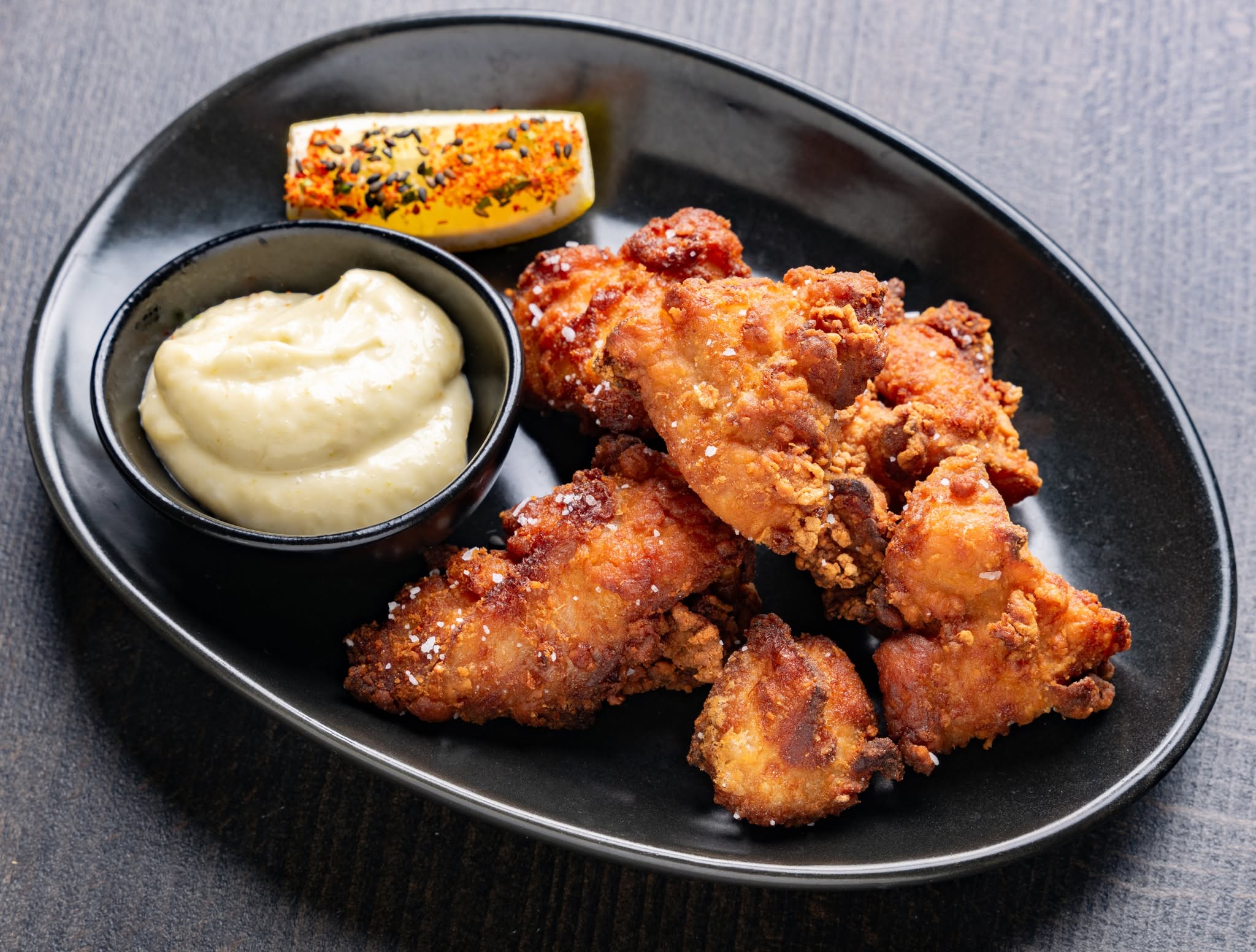 Chicken karaage with yuzu kosho mayo and lemon at Gaijin in Chicago