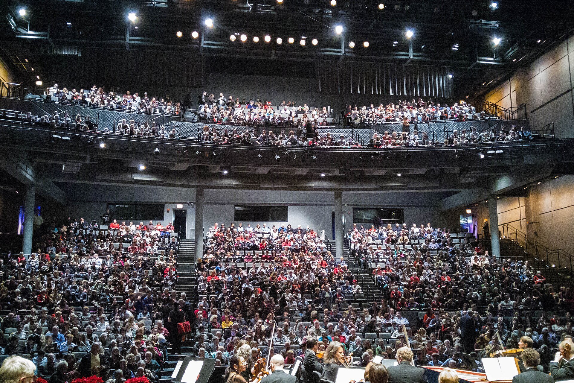 A full house inside the Harris Theater for Music and Dance in Chicago under stage lights