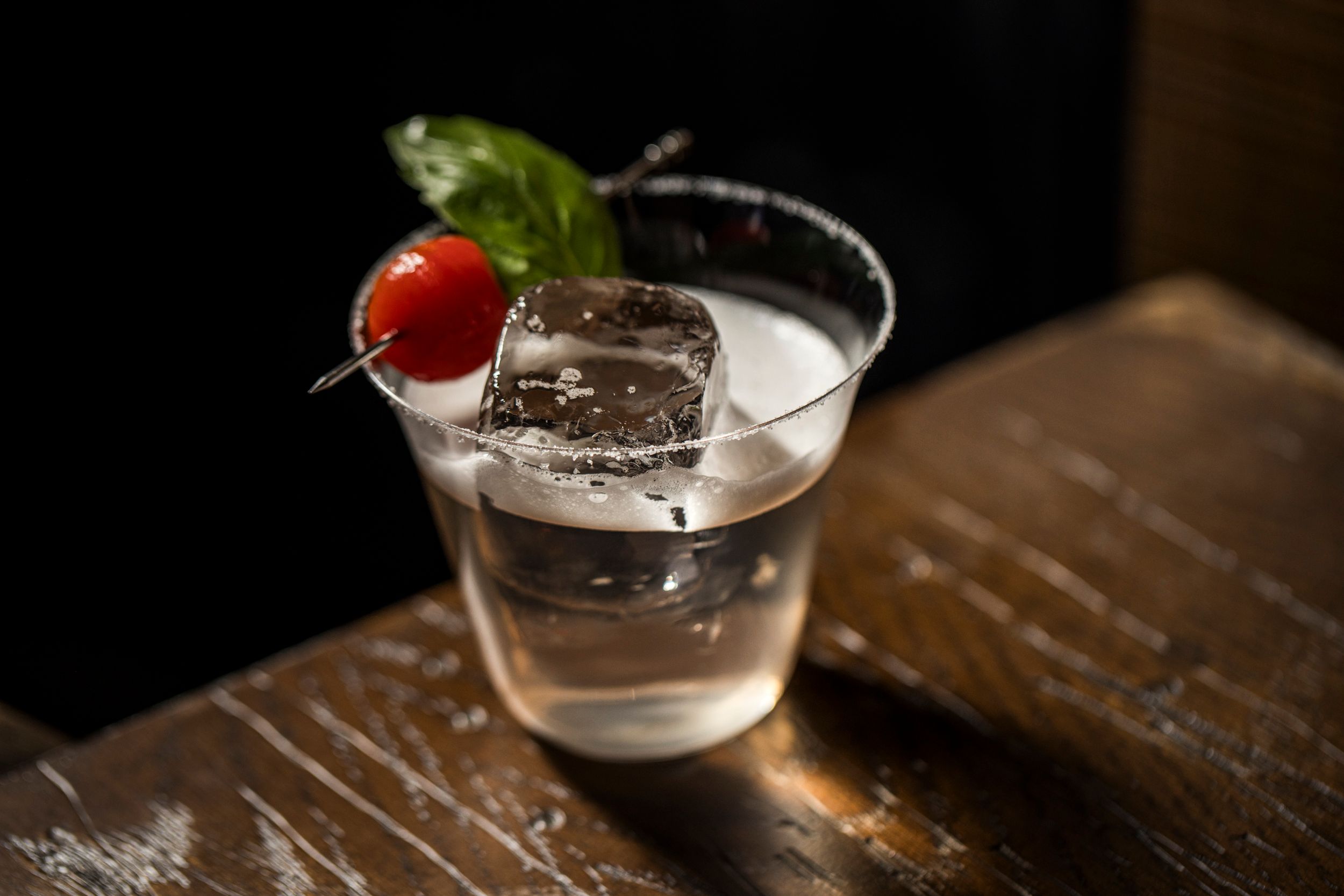 A tomato and basil garnished cocktail at Mile High Cocktail Club, Four Seasons Hotel Chicago