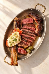 Nisi Greek Grill Rosemont surf and turf plate with steak seafood and Greek sides
