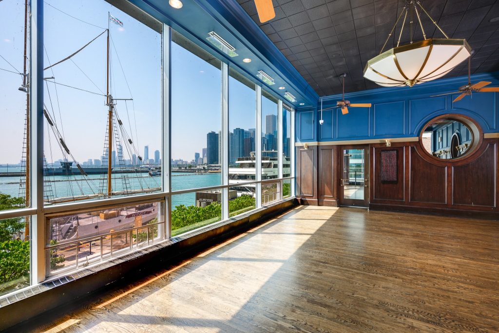 Bar Sol dining room at Navy Pier with floor-to-ceiling windows overlooking Lake Michigan